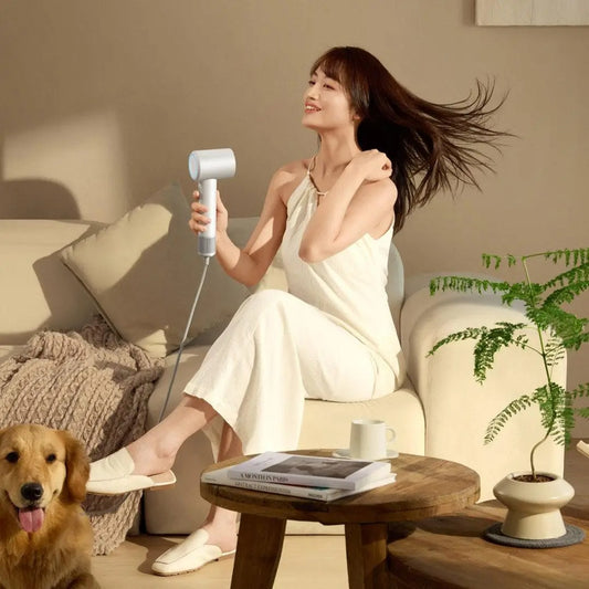 femme sechant cheveux diffuseur xiaomi